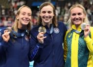Ariarne Titmus with Katie Ledecky and Paige Madden after the victory ceremony for women's 800m freestyle at the Paris Olympics 2024 (Image Source: Getty)